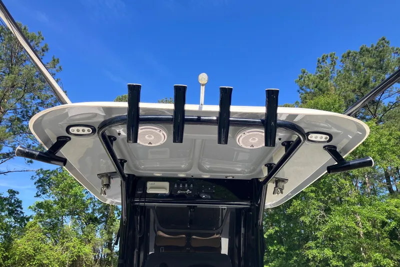 Slide: The Image of 2020 Sea Hunt Gamefish 27 boat top view with rod holders and speakers. - 50