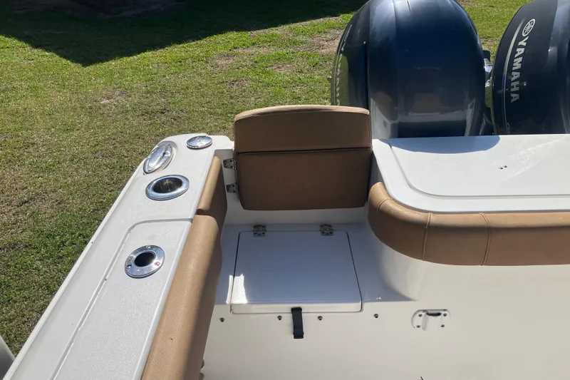 Slide: The Image of 2020 Sea Hunt Gamefish 27 boat with forward seating and dual Yamaha engines. - 56