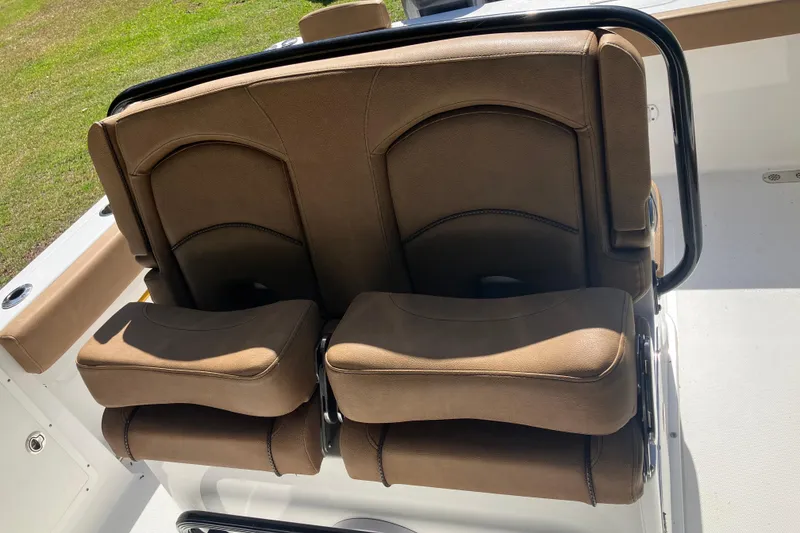 Slide: The Image of Brown leather seating on 2020 Sea Hunt Gamefish 27 boat, featuring forward seating design. - 63