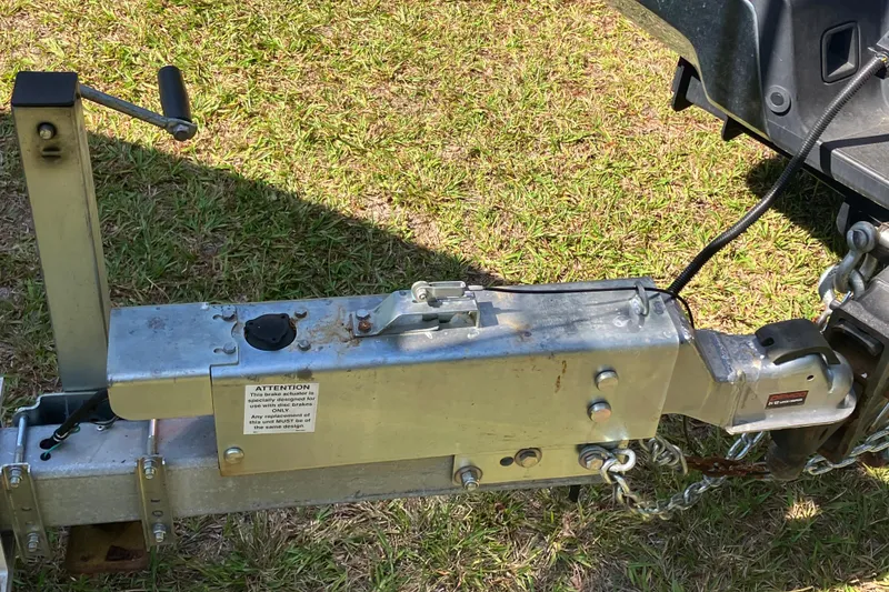 Slide: The Image of Trailer hitch of a 2020 Sea Hunt Gamefish 27 on grass. - 81