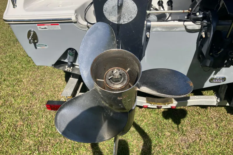Slide: The Image of Propeller of 2020 Sea Hunt Gamefish 27 boat on trailer, close-up view. - 88