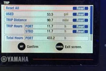 Slide: The Image of Yamaha trip display showing fuel usage, distance, and engine hours for Sea Hunt Gamefish 27. - 96
