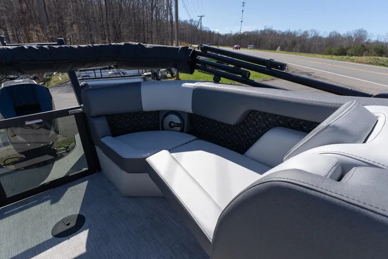 Slide: The Image of Interior of 2026 Alera M23Q boat with modern seating and sleek design. - 13