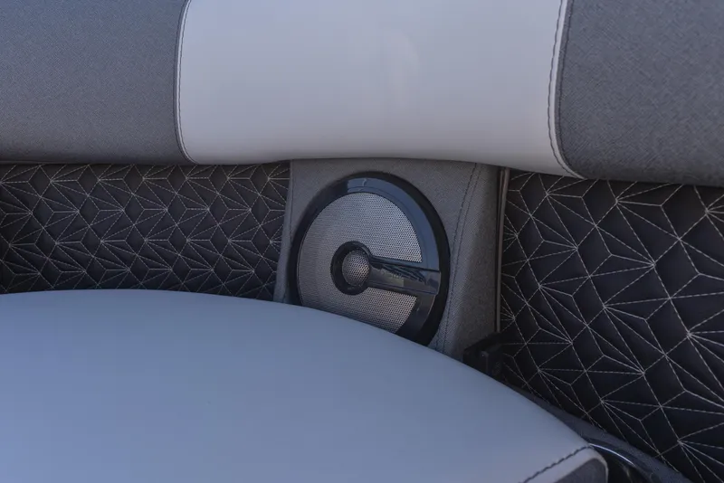 Slide: The Image of Luxurious interior of 2026 Alera M23Q with stylish upholstery and integrated speaker. - 14