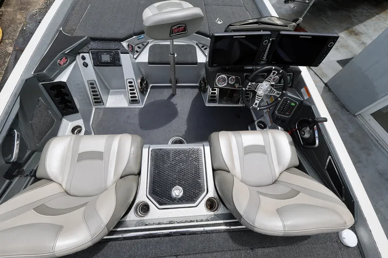 Slide: The Image of 2020 Ranger Z520L boat interior with dual seats and advanced control panel. - 10