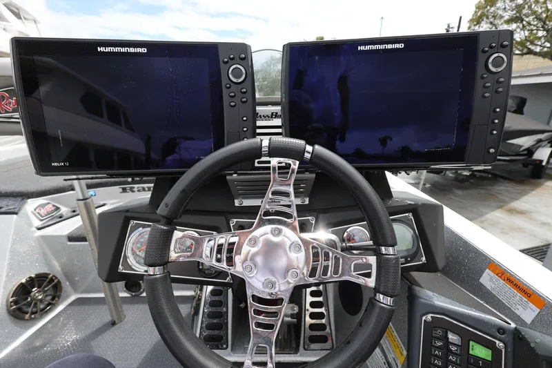Slide: The Image of Cockpit of 2020 Ranger Z520L boat with dual Humminbird Helix 12 displays. - 13