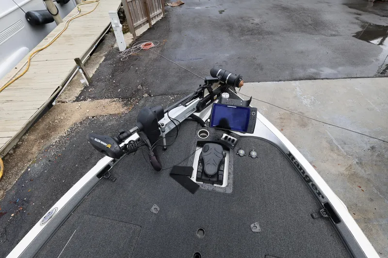 Slide: The Image of 2020 Ranger Z520L boat deck with trolling motor and navigation equipment. - 15