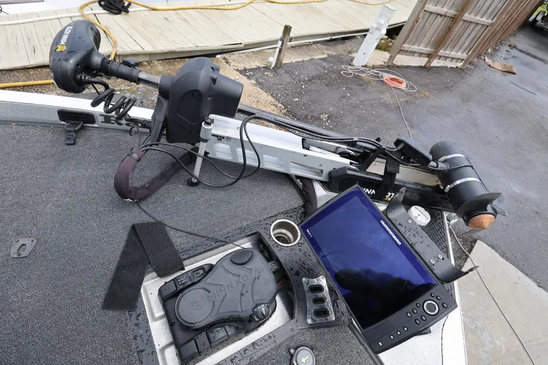 Slide: The Image of 2020 Ranger Z520L boat deck with trolling motor and fishfinder display. - 16