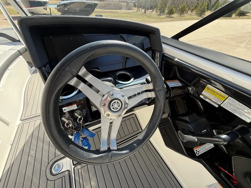 Slide: The Image of Yamaha 242 Limited S 2018 boat steering wheel and dashboard. - 11
