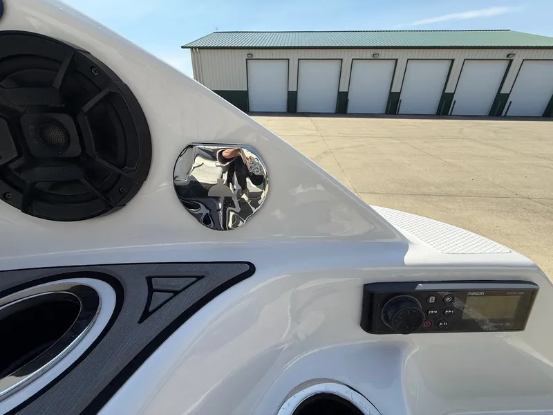 Slide: The Image of Yamaha 242 Limited S 2018 boat console with speaker and controls. - 36