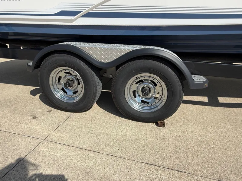 Slide: The Image of 2018 Yamaha Boats 242 Limited S on trailer, close-up of wheels. - 37