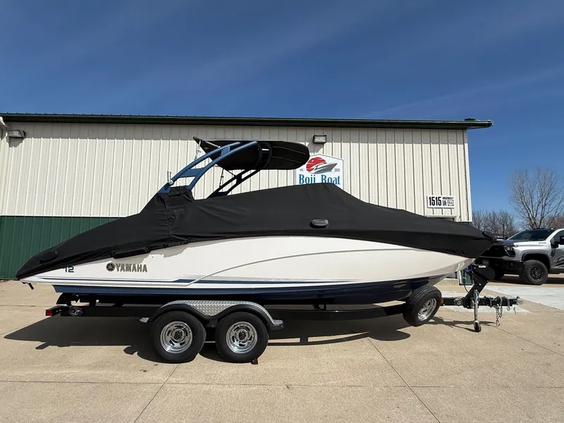 Slide: The Image of 2018 Yamaha Boats 242 Limited S with cover on trailer. - 40