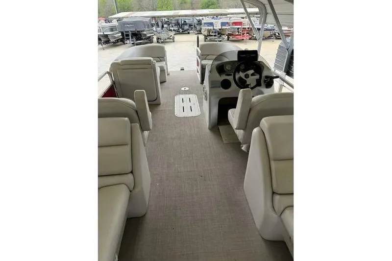Slide: The Image of 2016 G3 Angler V145 boat interior with seating and steering console. - 11
