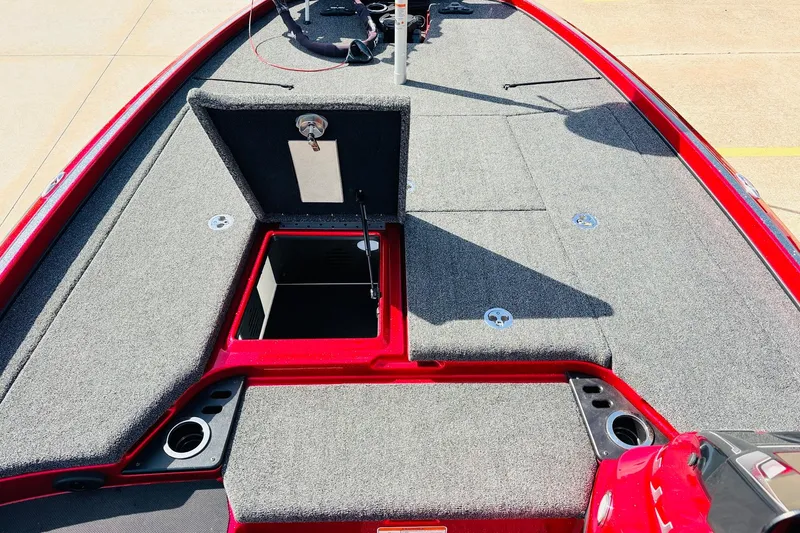 Slide: The Image of 2020 Nitro Z21 Pro boat deck with storage compartments and red trim. - 27