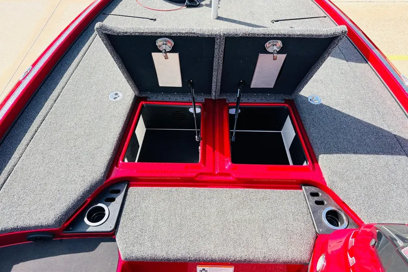 Slide: The Image of 2020 Nitro Z21 Pro boat with open storage compartments and red trim. - 31