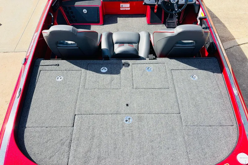 Slide: The Image of 2020 Nitro Z21 Pro boat interior with gray carpet and dual seats. - 44