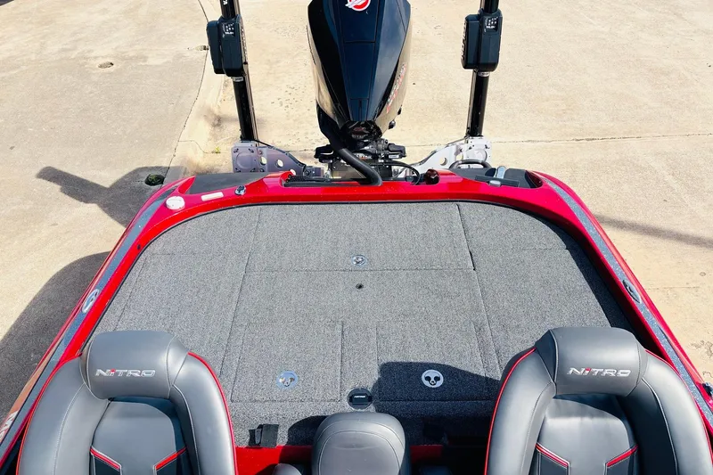 Slide: The Image of 2020 Nitro Z21 Pro boat interior with gray seats and carpeted deck. - 45