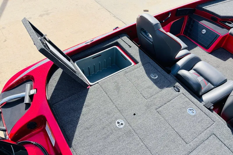 Slide: The Image of 2020 Nitro Z21 Pro boat interior with open storage compartment and seating. - 53