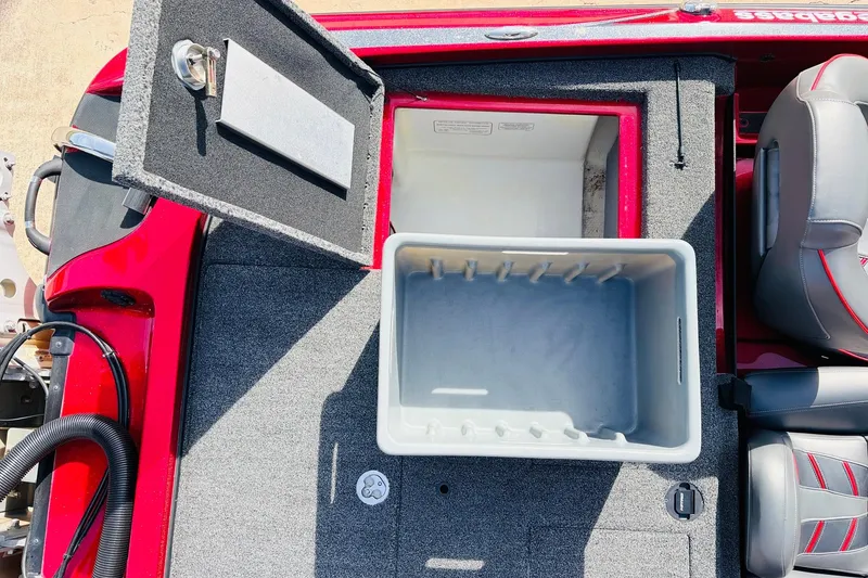 Slide: The Image of 2020 Nitro Z21 Pro boat interior with open storage compartment and seating. - 55