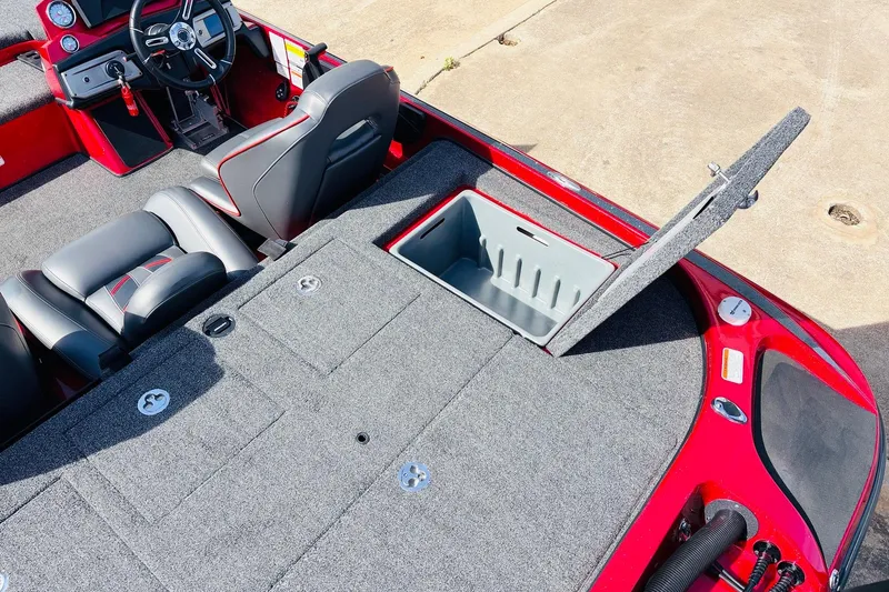 Slide: The Image of 2020 Nitro Z21 Pro boat interior with open storage compartment and sleek seating. - 57