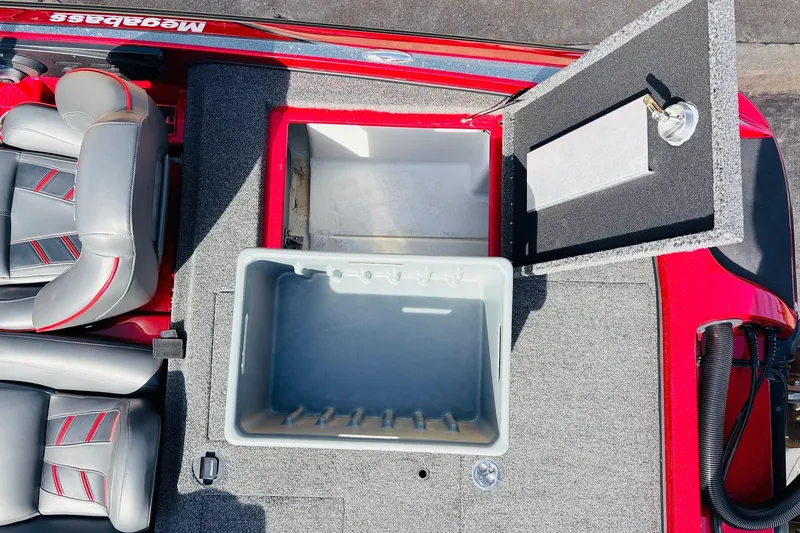 Slide: The Image of 2020 Nitro Z21 Pro boat interior with open storage compartment and cushioned seats. - 59