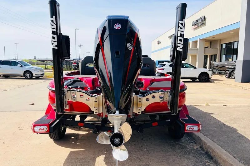 Slide: The Image of 2020 Nitro Z21 Pro boat with Talon anchors, parked outside a dealership. - 7