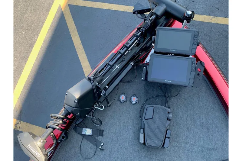 Slide: The Image of 2001 Ranger R83 boat deck with Garmin electronics and trolling motor. - 7