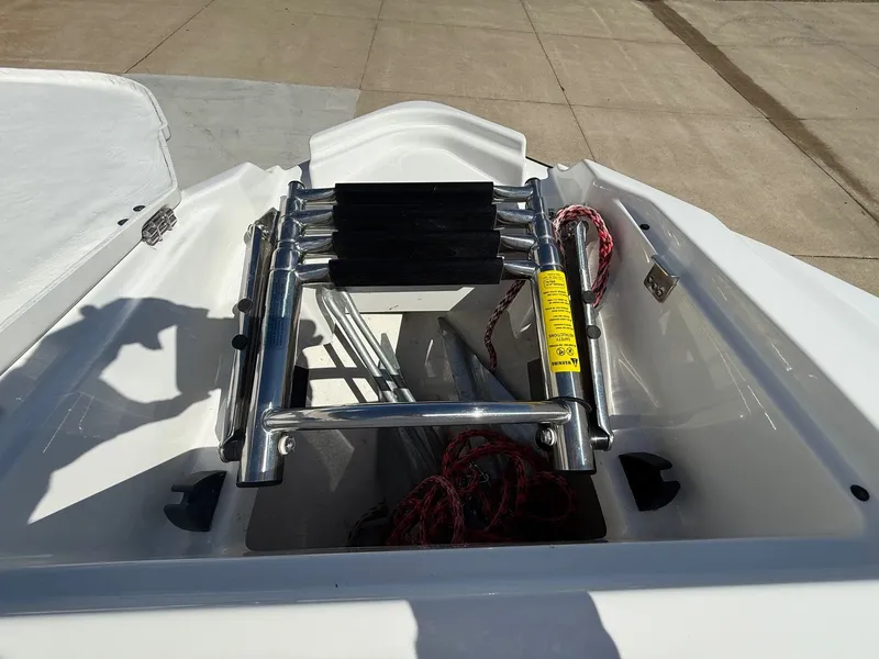 Slide: The Image of Monterey 278SS Super Sport 2022 boat ladder and storage area. - 12
