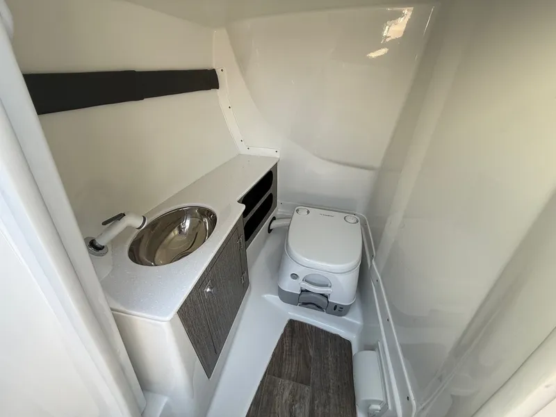 Slide: The Image of Interior of 2022 Monterey 278SS Super Sport with toilet and sink. - 20