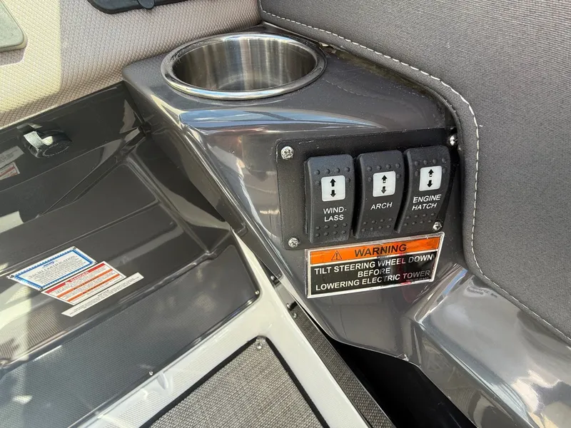 Slide: The Image of Control panel of 2022 Monterey 278SS Super Sport with cup holder. - 27