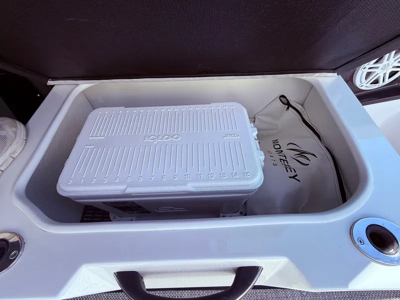 Slide: The Image of Monterey 278SS boat with Igloo cooler in storage compartment, 2022 model. - 33