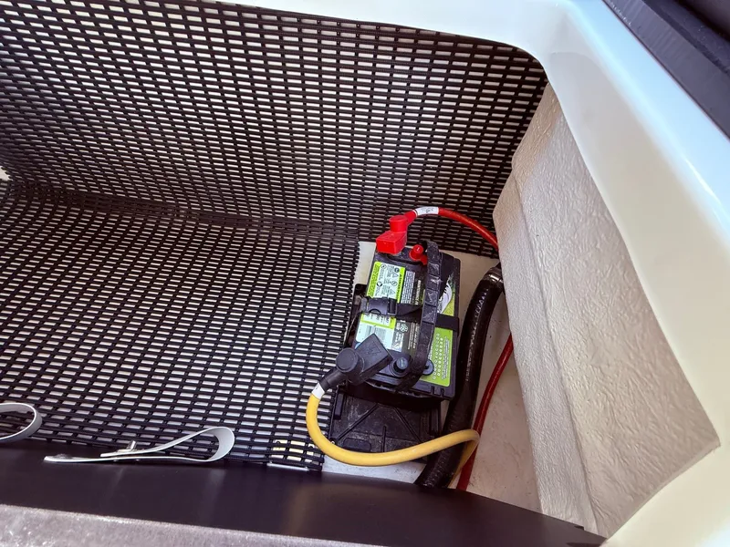 Slide: The Image of Battery in storage compartment of 2022 Monterey 278SS Super Sport boat. - 38