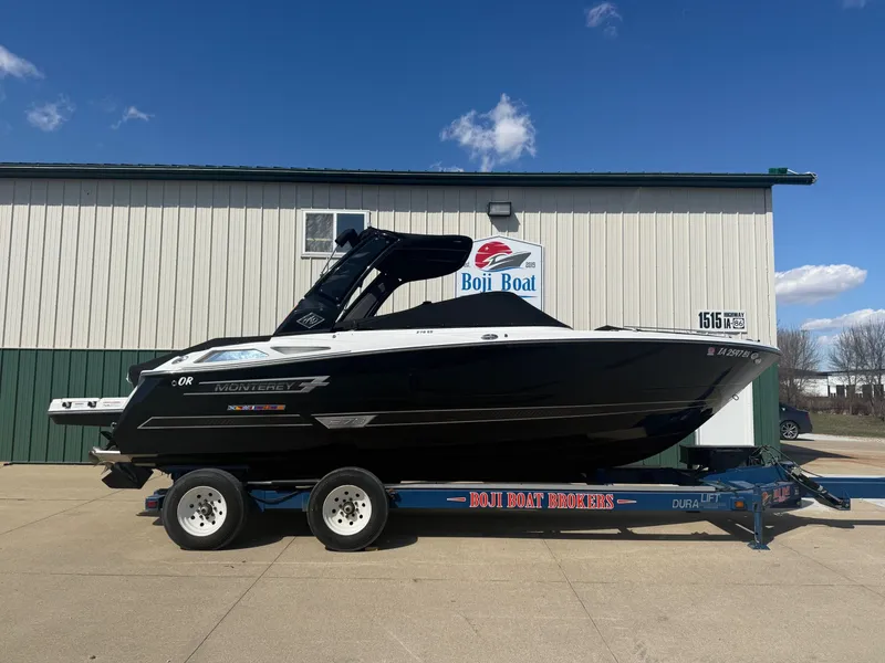 Slide: The Image of 2022 Monterey 278SS Super Sport on trailer outside Boji Boat building. - 49