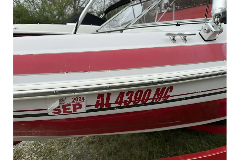 Slide: The Image of 2005 Tahoe Q4 Sport boat with Alabama registration and 2024 sticker. - 1