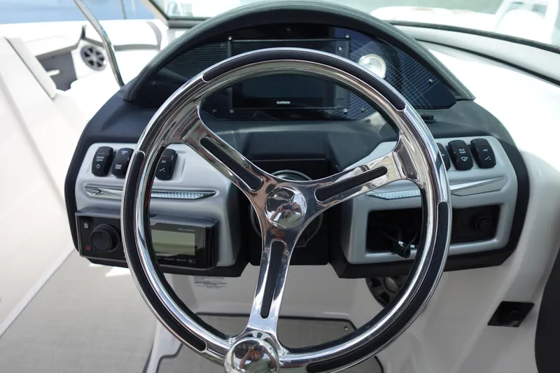 Slide: The Image of Steering wheel and dashboard of 2021 Regal 23 OBX boat. - 10
