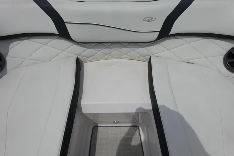 Slide: The Image of Interior seating of a 2021 Regal 23 OBX boat with quilted upholstery. - 18