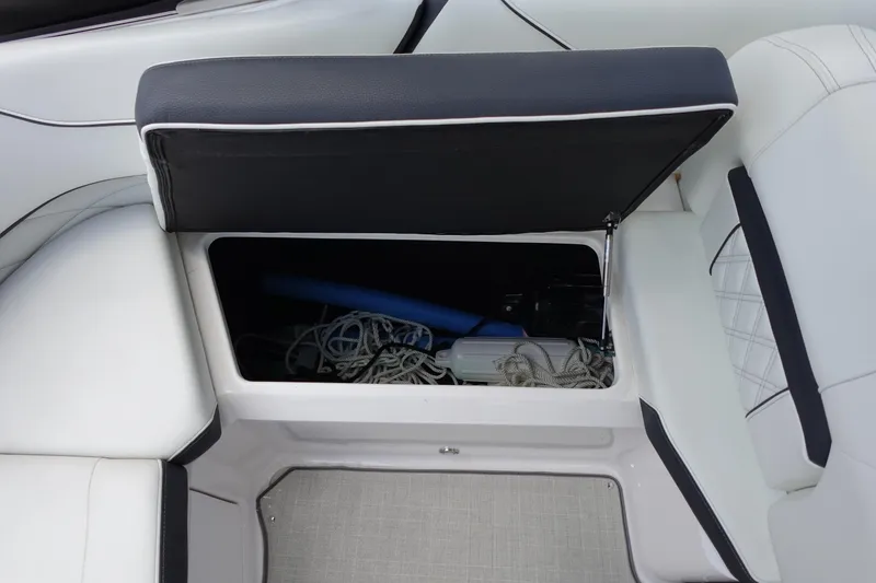 Slide: The Image of Open storage compartment in 2021 Regal 23 OBX boat with ropes and equipment. - 42