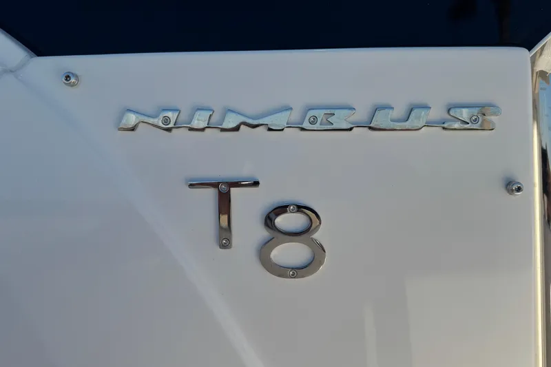 Slide: The Image of Close-up of 2025 Nimbus Tender 8 logo on a white surface. - 11