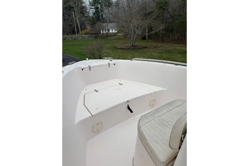 Slide: The Image of 2001 Grady-White Fisherman 180 boat interior with seating and storage compartment. - 7