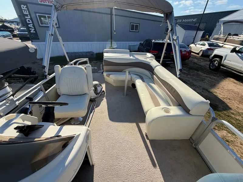 Slide: The Image of Interior of a 2008 Bennington 2250GL Pontoon boat with seating. - 4