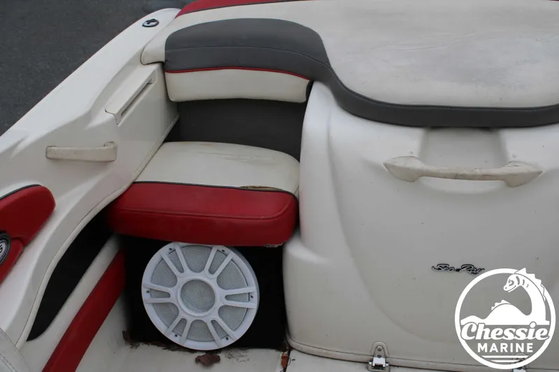 Slide: The Image of Interior of a 2006 Sea Ray 205 Sport boat with speaker. - 13
