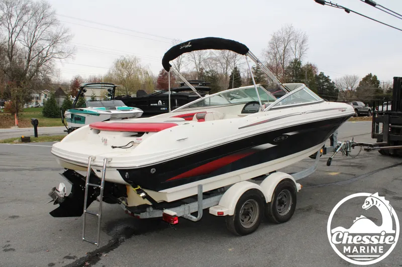 Slide: The Image of 2006 Sea Ray 205 Sport boat on trailer at Chessie Marine. - 3