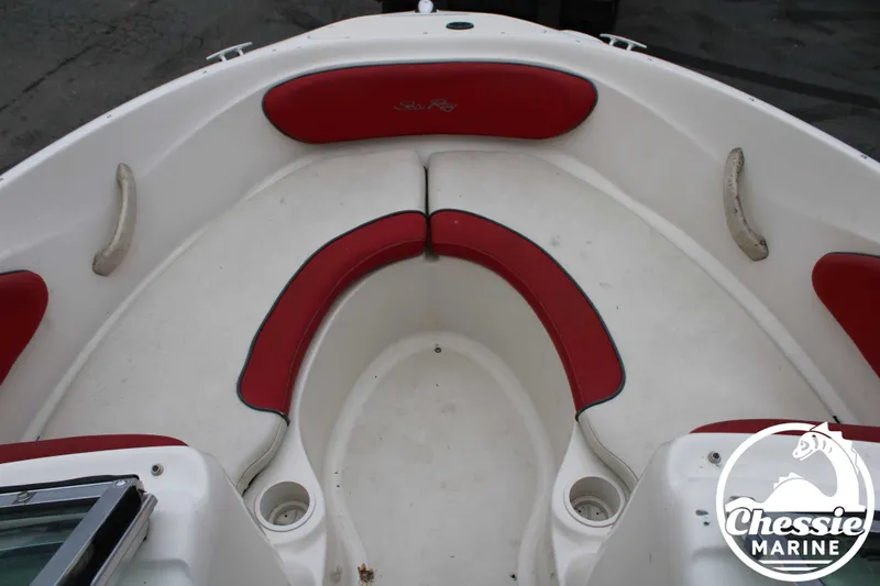 Slide: The Image of Interior view of a 2006 Sea Ray 205 Sport boat with red seating. - 8