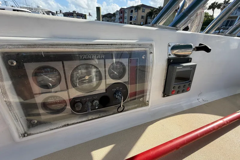 Slide: The Image of Control panel of a 1992 Hunter Passage 42 sailboat with Yanmar engine gauges. - 10
