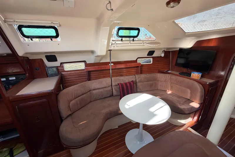 Slide: The Image of Interior of 1992 Hunter Passage 42 yacht with cozy seating and modern amenities. - 19