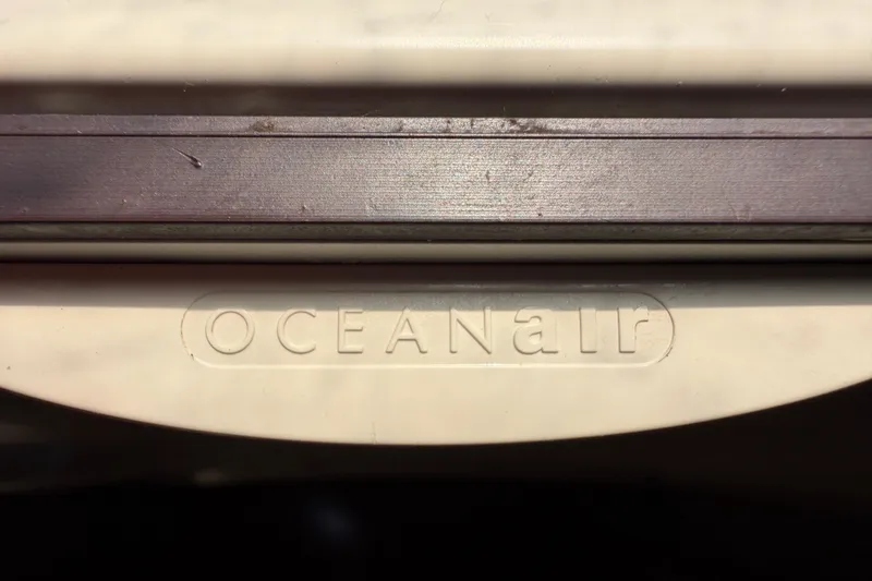 Slide: The Image of Close-up of Oceanair logo on 1992 Hunter Passage 42 yacht. - 30
