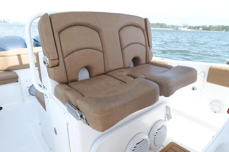 Slide: The Image of Brown leather seating on 2021 Sea Hunt Ultra 305 SE boat, with ocean view. - 15