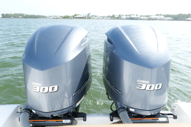 Slide: The Image of Twin Yamaha 300 outboard engines on a 2021 Sea Hunt Ultra 305 SE boat. - 21