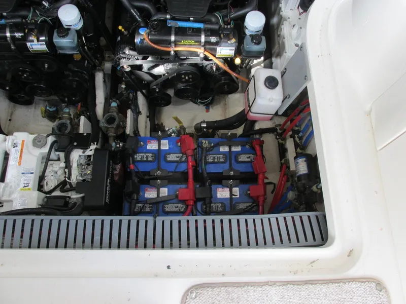 Slide: The Image of Engine compartment of 2006 Sea Ray 300 Sundancer with batteries. - 10