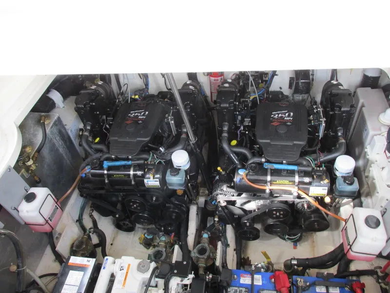 Slide: The Image of Engine room of 2006 Sea Ray 300 Sundancer with dual engines. - 19